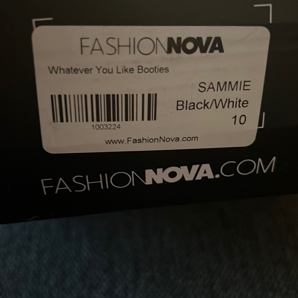 snake print thin heel boots.Box is slightly beat up from shipping